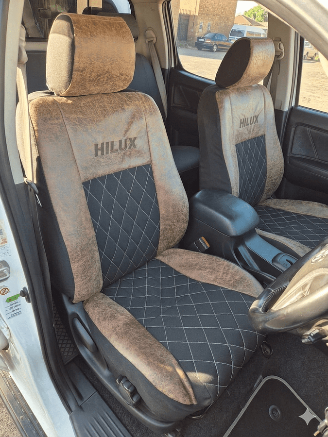 Car seat upholstery fabric — Renoster and leather vehicle interior, Hilux